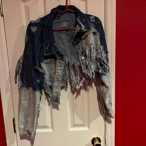 Distressed jean jacket